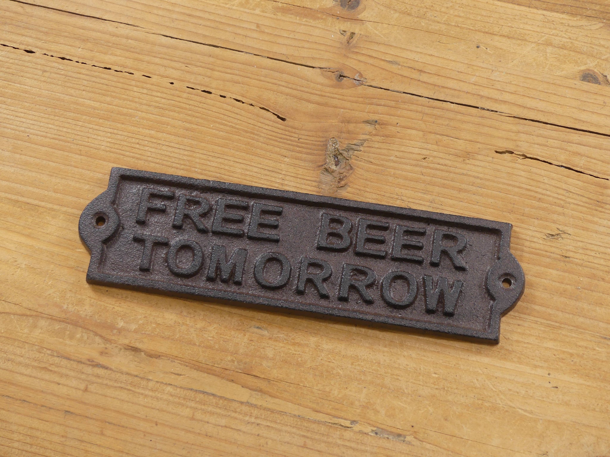 "FREE BEER TOMORROW" CAST IRON SIGN