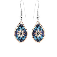 F 28 Textured blue flower earrings