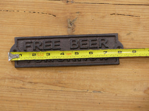 "FREE BEER TOMORROW" CAST IRON SIGN